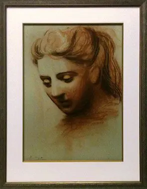 Drawing of a woman's head in frame.