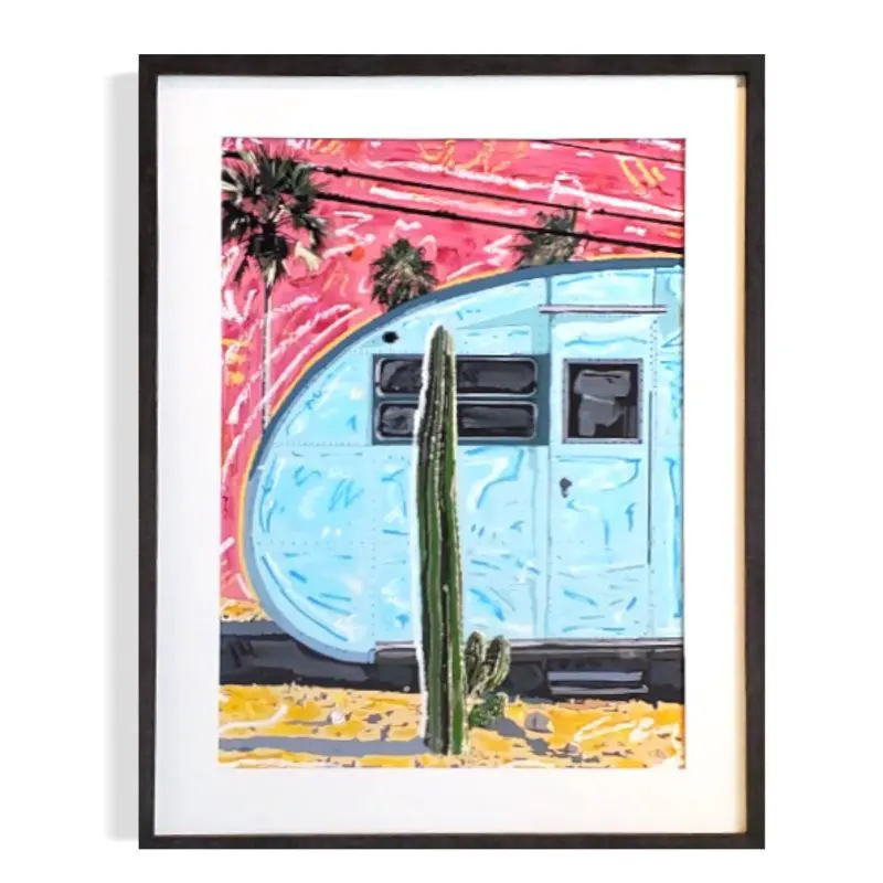 Painting of trailer with cactus and palm trees.