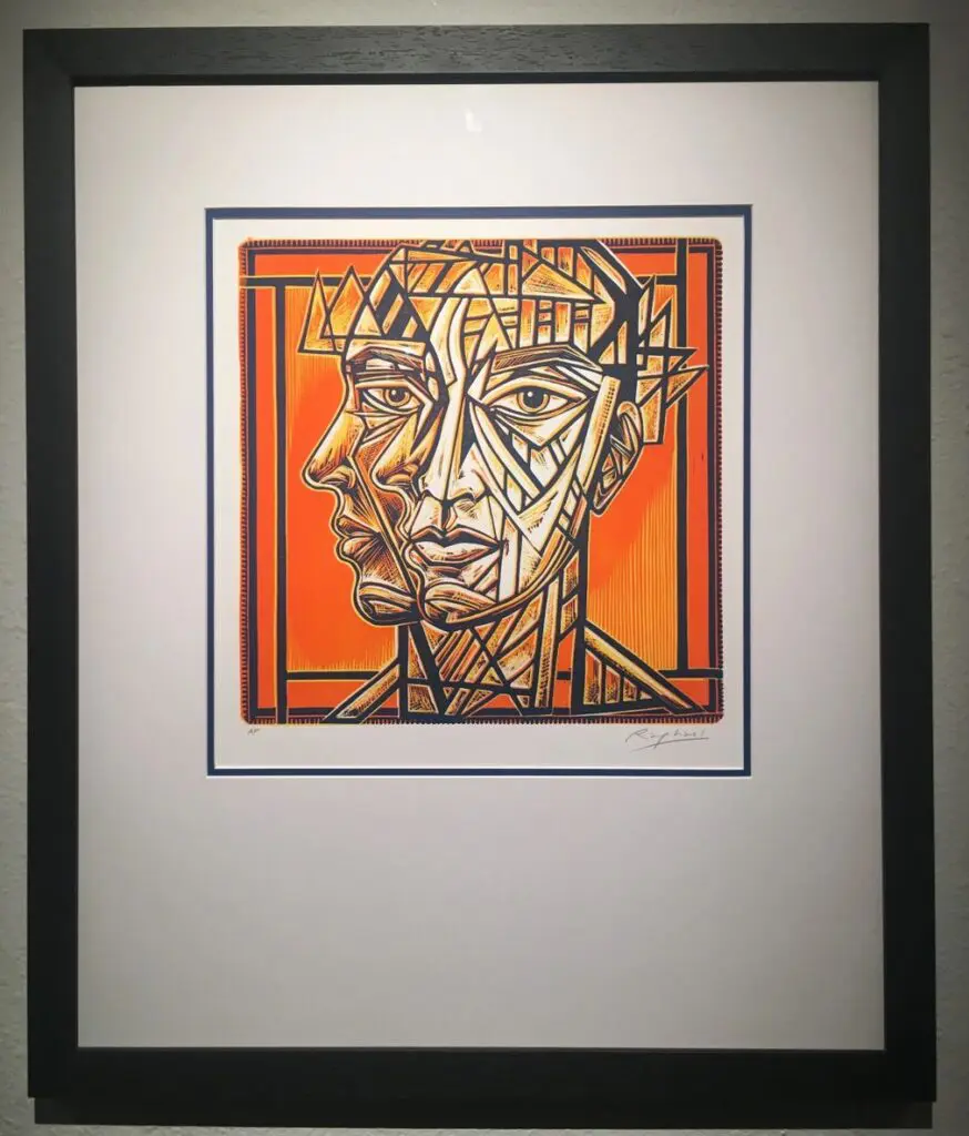 Cubist portrait of a face with orange background.